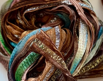 10m in 2x5m lengths of high quality ribbon yarn, in neutral brown, cream, grey and multicolour. Colinette, Louisa Harding, Trendsetter Segue