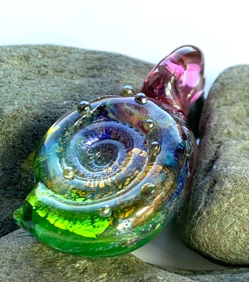 Large sparkling purple green and gold glass ammonite lampwork pendant