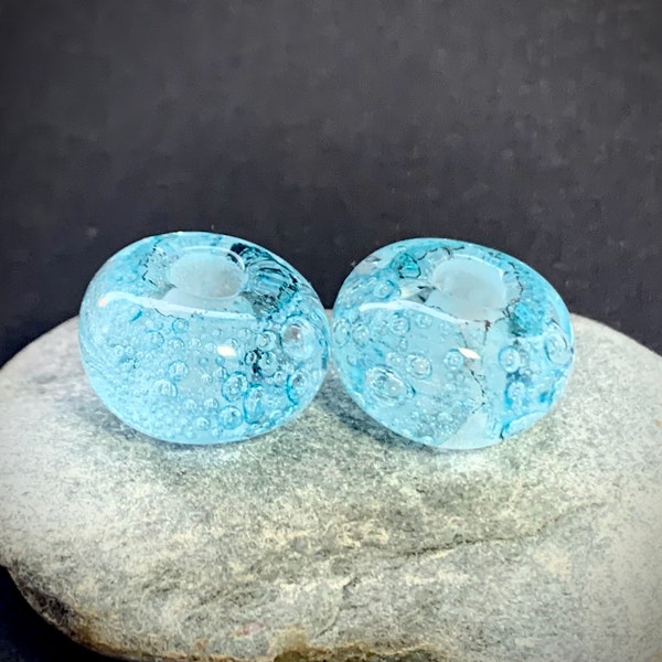 Pale transparent turquoise big hole ocean bubble beads. Suitable for Pandora, Troll, European charm bracelets. 5mm bead hole