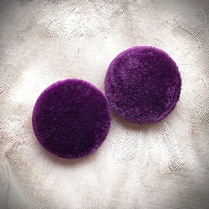Pair of bright purple silk velvet buttons