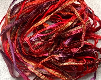 Mixed red palette high quality ribbon yarn. 5 strands of 2 metres each. Colinette, Louisa Harding, Trendsetter