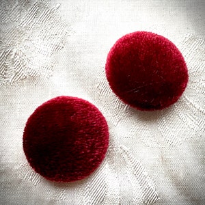 Pair of deep red silk velvet buttons