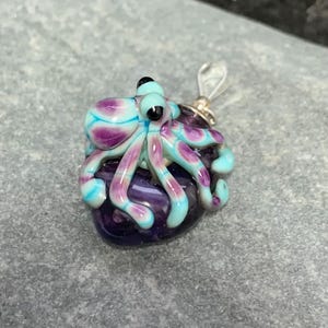 Copper green and purple reticulated octopus lampwork glass pendant with sterling silver bail