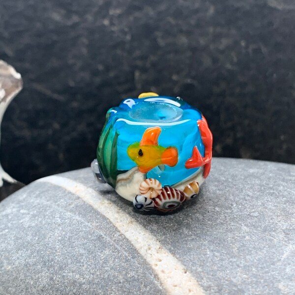 Ocean lampwork glass 9mm hole dread bead with turtle and fish. Also suitable for beadwork and macrame jewellery projects