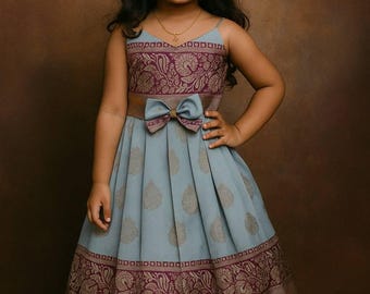 Kids Dusty Blue & Wine Jacquard Waving Pattern Design with Sleeveless Frock with Bow and Gold Zari Work