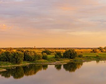 Sunset overlooking the River Elbe. Photographic print.
