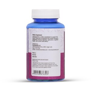 May include: A blue plastic bottle with a white cap, containing dietary supplements. The label includes text about Ashwagandha and its potential benefits. The bottle has a purple and white label with product information and a barcode.