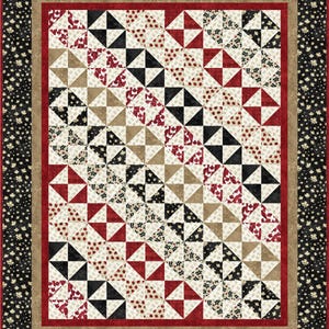 May include: A patchwork quilt featuring a repeating pattern of black, red, tan, and cream-coloured squares and triangles. The quilt has a black border with a white leaf pattern and a red inner border. The quilt is a mix of geometric shapes and patterns.