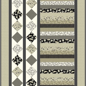 May include: A quilt with a patchwork design featuring various patterns of bicycles, cars, and geometric shapes in shades of gray, black, and white.
