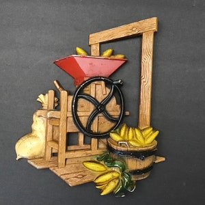 Vintage Homco Corn Sheller Metal Wall Plaque