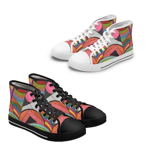 May include: Two pairs of high-top trainers with vibrant abstract patterns. One pair has white soles and laces, the other has black soles and laces. The designs incorporate pink, orange, yellow, green, and blue geometric shapes.