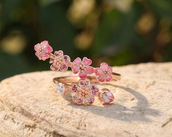 Roségouden ring met perzikbloesem | Roze emaille bloem, zirkonia bloemenband