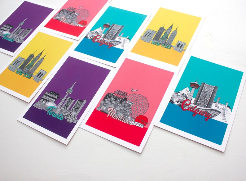 May include: Set of 8 postcards featuring city skylines of Toronto, Montreal, Calgary, New York, with each postcard having a different background color. The postcards are printed on white cardstock.