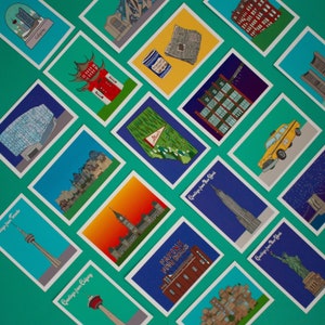 May include: A collection of colorful postcards featuring various landmarks and greetings from different cities across Canada. The postcards are arranged in a grid pattern on a teal background.