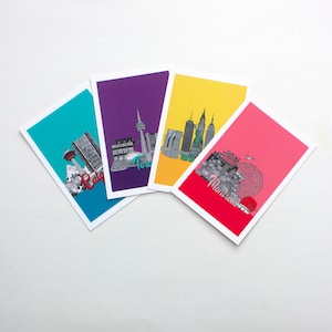 May include: Four postcards with illustrations of Canadian cities. The postcards are blue, purple, yellow, and pink. The cities are Calgary, Toronto, Vancouver, and Montreal.