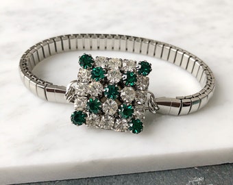Repurposed clear vintage rhinestone swirl and silver tone stetch watchband bracelet