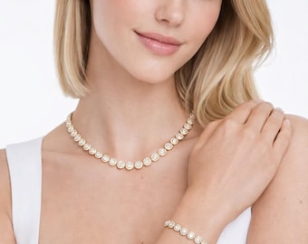 Conjunto de joyas de tenis de acero inoxidable bañado en oro con cristales Swarovski Elements: collar y pulsera a juego, un regalo elegante para mujer.