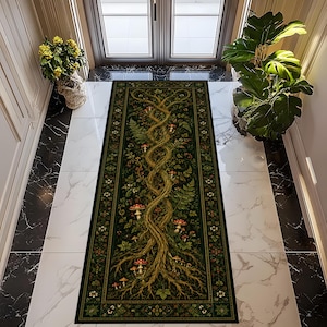 May include: A rectangular runner rug featuring a dark green background with a central design of two intertwined tree trunks with exposed roots, surrounded by green ferns, small white flowers, and several red-capped mushrooms with white spots.
