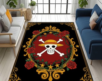 May include: Rectangular black rug with a central design of a skull and crossbones wearing a straw hat, framed by roses and gold detailing. The rug has a black border with gold scrollwork. The rug is placed in a living room setting.