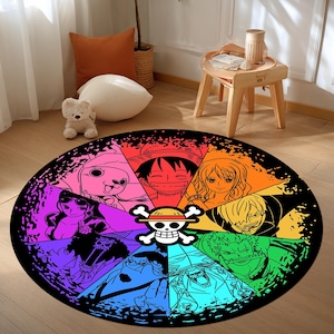 May include: A round rug featuring a colorful design with characters from the anime series One Piece. The rug has a black border and a central emblem of a skull and crossbones with a straw hat. The characters are in a rainbow color scheme.