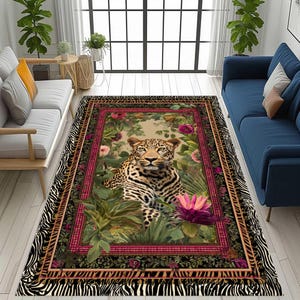 May include: Rectangular area rug featuring a leopard surrounded by flowers and foliage. The rug has a black and white zebra print border with a fringed edge. The central design includes a leopard, pink flowers, and green leaves.