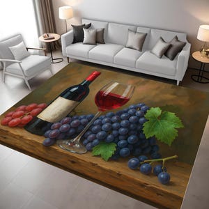 May include: A rectangular rug with a wine and grape still life design. A bottle of red wine, a glass of wine, and bunches of red and purple grapes are on a wooden surface. Green leaves provide a contrast.