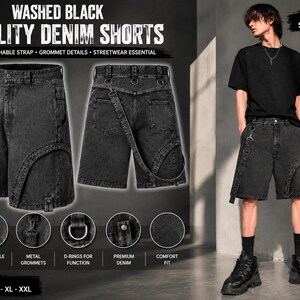 Op de afbeelding: Gewassen zwarte utility denim shorts met afneembare bandjes en metalen grommets. De shorts hebben D-ringen en zijn ontworpen voor een comfortabele pasvorm. De tekst "UNISEX STREETWEAR" en maten zijn ook inbegrepen.