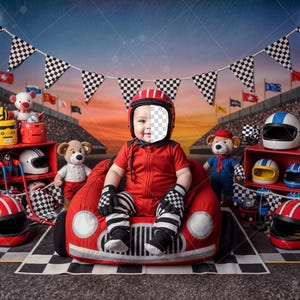 May include: A baby in a red racing suit and helmet sits in a red car-shaped prop. The scene is decorated with race flags, teddy bears, and miniature racing helmets. The background shows a stadium and flags.
