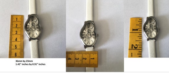 サルバドールダリ腕時計 レディース シルバー　ブレスレットウォッチ ゴールドシルバーサルバドールダリインスパイアレッド