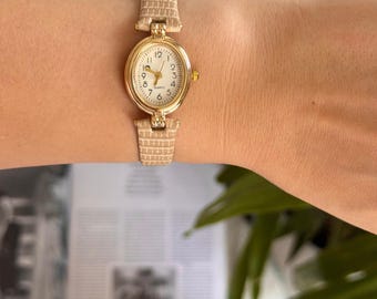 Damengolduhr: Ovales Gehäuse, Quarzlederarmband, Geschenk für sie