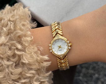 Reloj de mujer color oro, con brazalete, esfera ovalada, 26 mm, regalo para ella.
