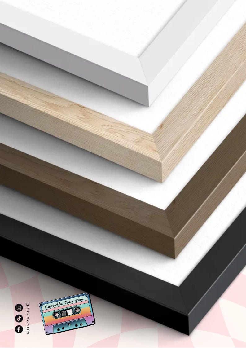 May include: Close-up of four picture frames in white, light wood, brown, and black. The frames are angled, showcasing their different colors and textures. The frames are on a white background. The Cassette Collective logo is in the bottom left corner.