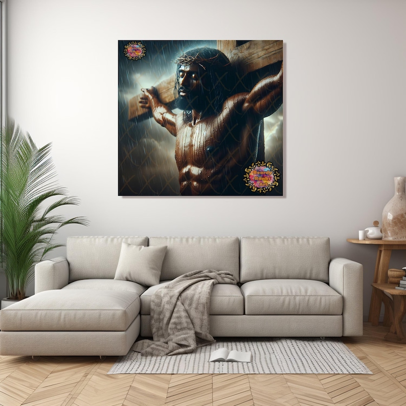 May include: A large canvas print showing a muscular figure bearing a wooden cross, wearing a crown of thorns. The artwork is set against a stormy backdrop, with rain and dramatic lighting. The print is displayed on a wall above a beige sofa.
