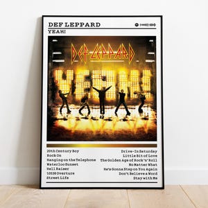 May include: A framed poster featuring the Def Leppard album "Yeah!". The image shows the band silhouetted against a bright, illuminated background with the album title. The poster includes a tracklist of songs from the album.