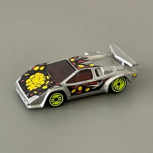 Vintage 1993 Hot Wheels Mattel Lamborghini Countach REVEALERS Silver Ultra Hots Malaysia Mystery Cars