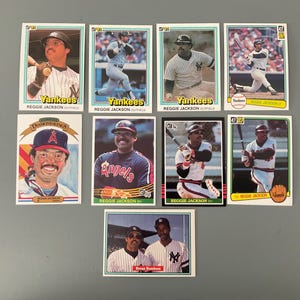 Lotto di (9) carte da baseball Donruss di Reggie Jackson 1981-85, diverse edizioni originali, New York Yankees, California Angels, HOF, belle
