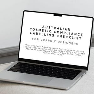 May include: A laptop displaying a checklist for Australian cosmetic compliance labeling. The text on the screen and in the background reads "Australian Cosmetic Compliance Labelling Checklist for Graphic Designers." The image also includes the words "Digital Download."