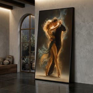 May include: A framed artwork depicts a couple dancing the tango. The woman wears a flowing teal dress and high heels, while the man is in a black suit. The artwork has a warm, glowing effect around the figures, set against a dark background.