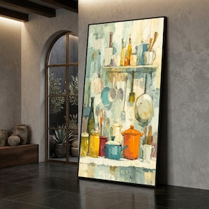 May include: A framed art print depicting a colorful kitchen scene. The artwork showcases various kitchen utensils, pots, and pans in shades of blue, orange, yellow, and white. The painting has a textured, watercolor-like appearance, with a shelf holding mugs and bottles.