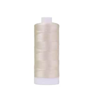 May include: A spool of sewing thread in a light cream or off-white color. The thread is wound tightly around a cylindrical plastic core with a white base and a white top cap, creating a smooth, uniform appearance for this essential sewing supply.