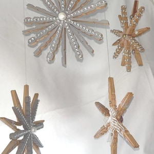 handmade hanging stars from clothing pegs, boho wall decor, eco friendly gift