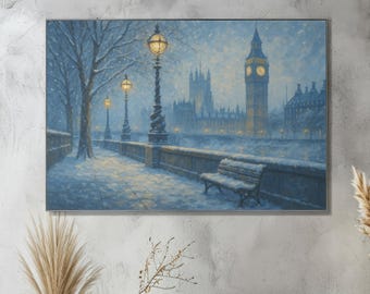 May include: A framed canvas print depicts a snowy winter scene in London. The artwork features Big Ben and the Houses of Parliament in the background, with lampposts and a bench along a snow-covered path in the foreground. The color palette is primarily cool blues and whites.