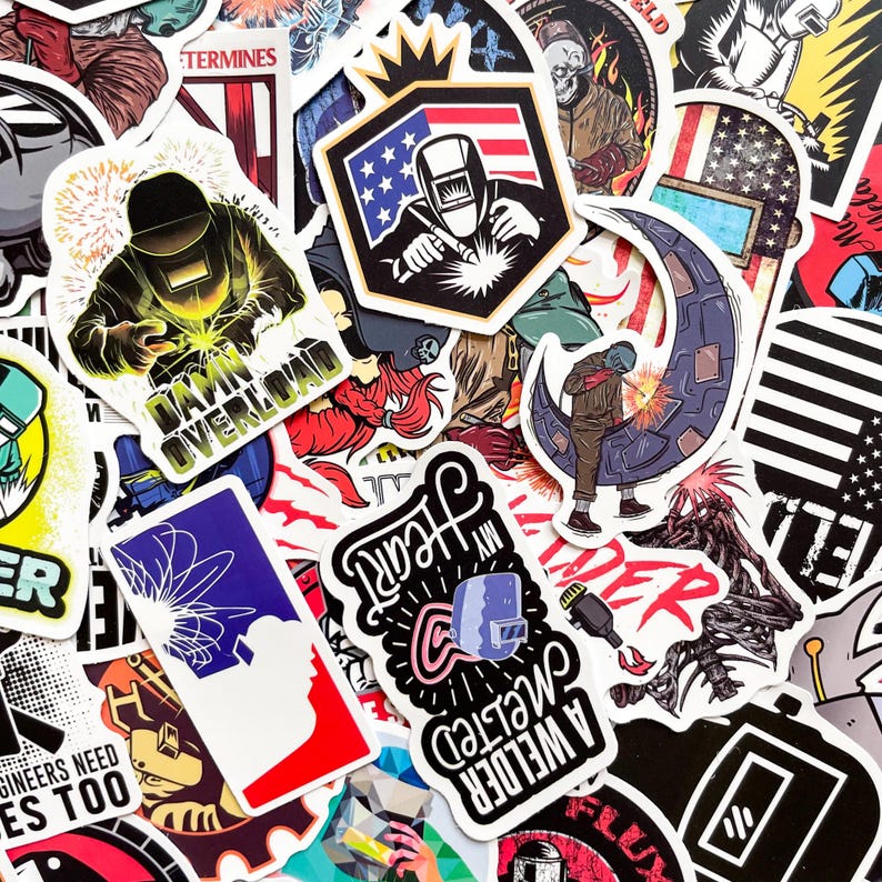 May include: A collection of colorful stickers featuring welding themes. Designs include welders with helmets, sparks, and text like "Damn Overload" and "A Welder Melted My Heart." Patriotic stars and stripes are also present.