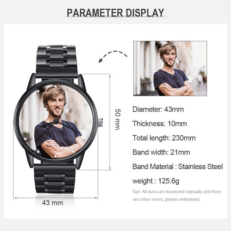 May include: Black stainless steel watch featuring a photo on the watch face. The watch has a 43mm diameter, 10mm thickness, and a total length of 230mm. The band width is 21mm. The watch weighs 125.6 grams.
