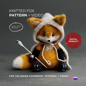 May include: A knitted fox doll with a hooded cape, holding a small stick with a green tip. The fox is orange, white, and black, with a white hood. Text on the image reads "KNITTED FOX PATTERN + VIDEO" and "DIGITAL PRODUCT."