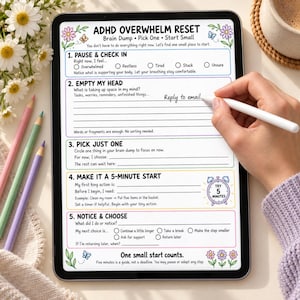 May include: A digital tablet displaying an ADHD Overwhelm Reset worksheet with five steps: Pause & Check In, Empty My Head, Pick Just One, Make It A 5-Minute Start, and Notice & Choose. The screen shows handwritten text and floral illustrations.
