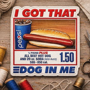 May include: Embroidered patch with a hot dog, Pepsi cup, and the text "I GOT THAT." The patch also includes the text "¼ POUND PLUS ALL BEEF HOT DOG AND 20 oz. SODA (With Refill)" and "DOG IN ME."