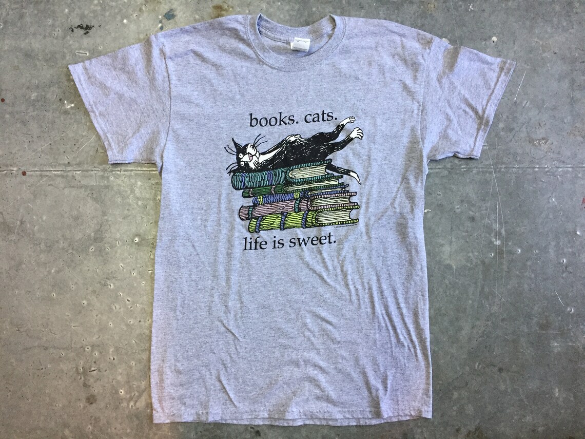 Cats and Books tshirt by Edward Gorey. Etsy