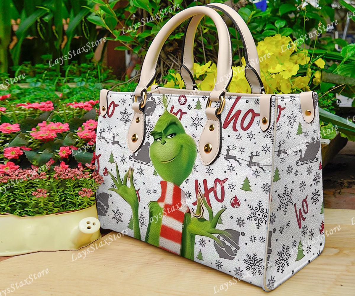 Discover Personalized funny character Christmas Leather Handbag, funny character Women Bags