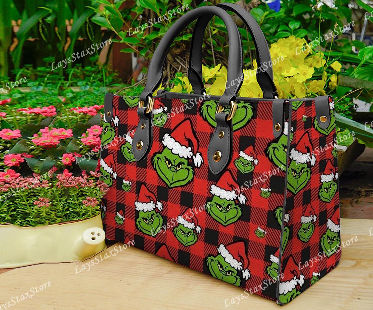 Discover Personalized funny character Christmas Leather Handbag, funny character Women Bags
